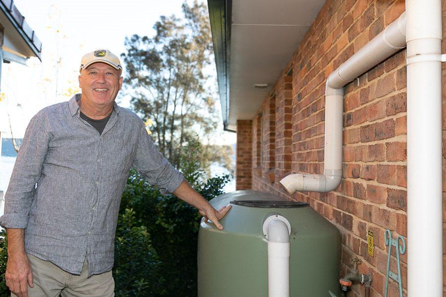 Man with water tank